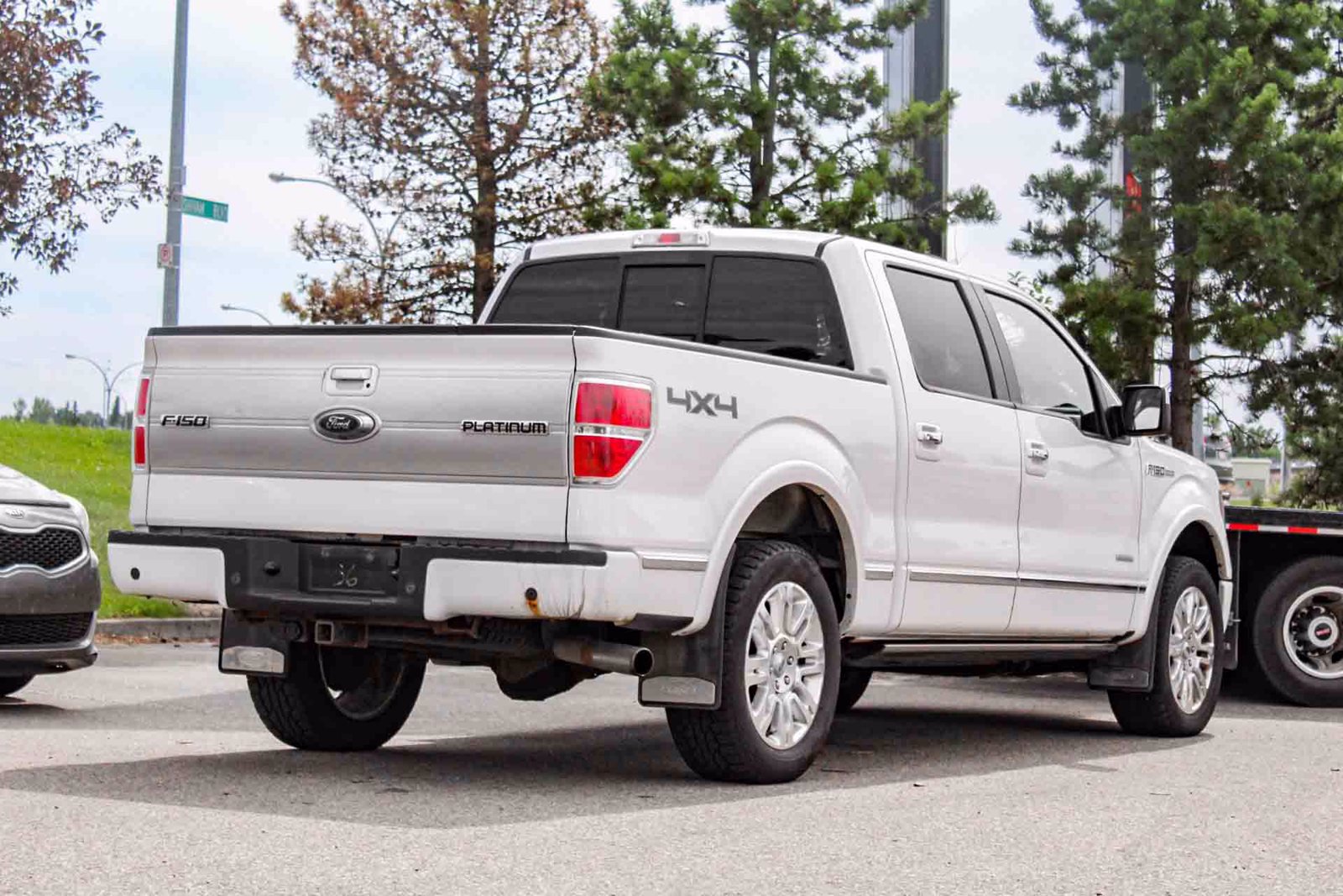 Pre-Owned 2014 Ford F-150 Platinum 3.5L 4WD Crew Cab Pickup